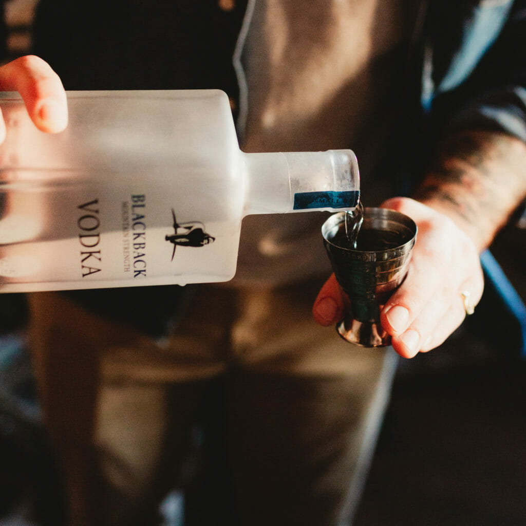 Cocktail mixologist Spike Van de Merwe mixing up a Blackback Mountain Strength Vodka Cocktail - Gorilla Spirits Co.